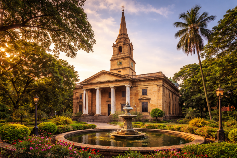 St. John’s Church Kolkata historic colonial church with neoclassical pillars, clock tower and garden at golden hour